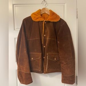 Vintage leather jacket with shearling lining and collar